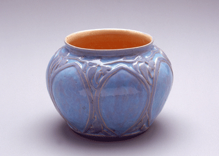 Fig. 3. Earthenware vase with pale blue and mauve glaze and carved gum leaves design, 1929
by Violet Mace, Boswell, Tasmania
Powerhouse Museum