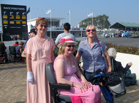 Three sisters, who had chosen to dress in accord with Goodwood Revival's theme, spending time in 'another world'