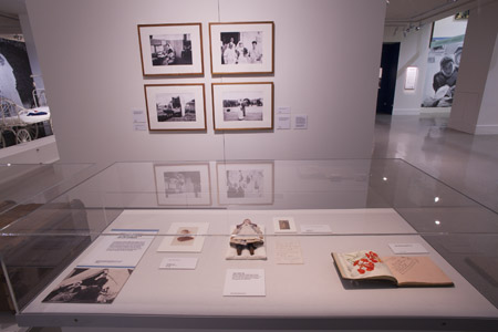 A showcase of eclectic personal items, including a doll dressed as a nurse