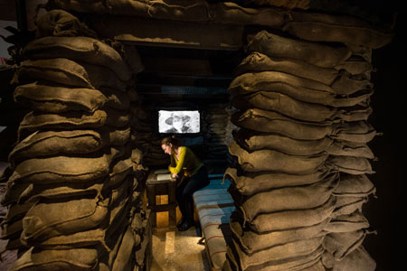 A visitor in the replica of Malone’s dugout
