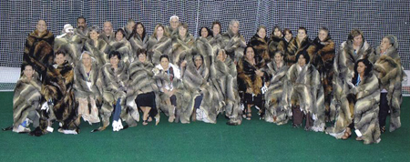 Elders and community representatives from 35 Victorian language groups in possum-skin cloaks for the opening ceremony, Commonwealth Games, Melbourne, March 2006.