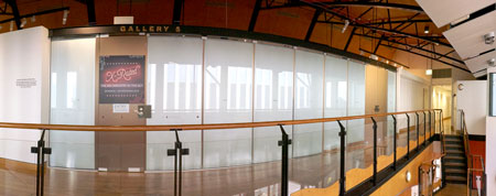 Blinds on the internal gallery windows were used to conceal the exhibition