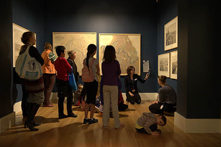 The original designs for the nation’s new capital are displayed in an elegant gallery setting