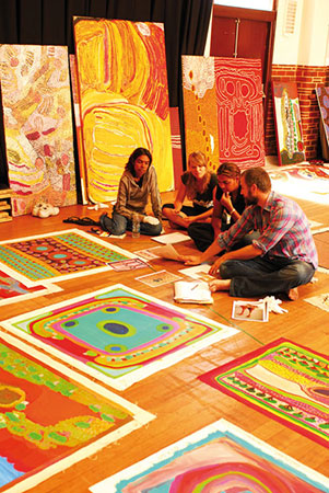 Curators work with the collection at the Black Swan Theatre, Perth