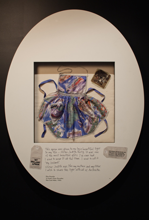 Apron made for Mary Brownlee by Sister Judith Kelly