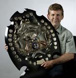 Guy-Hansen-with-shield_w150
