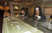 Two of Eddie Mabo's daughters view their father's papers